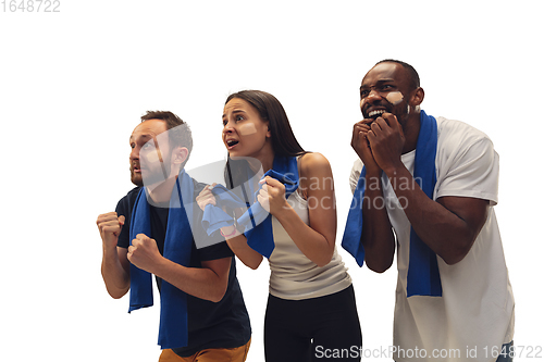 Image of Multiethnic soccer fans cheering for favourite sport team with bright emotions isolated on white studio background