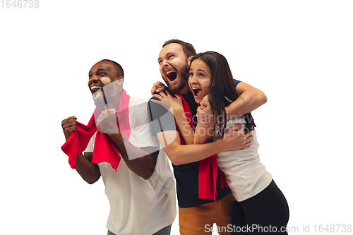 Image of Multiethnic soccer fans cheering for favourite sport team with bright emotions isolated on white studio background