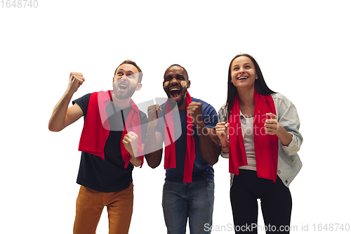 Image of Multiethnic soccer fans cheering for favourite sport team with bright emotions isolated on white studio background