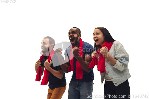 Image of Multiethnic soccer fans cheering for favourite sport team with bright emotions isolated on white studio background