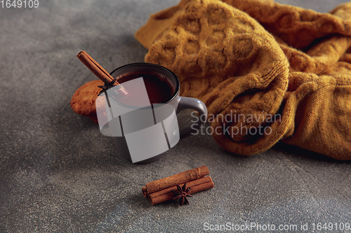 Image of Cup of tea or coffee with cinnamon and cookies isolated on grey and white background. Copy Space for ad, design.