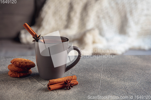 Image of Closeup cup of tea or coffee with cinnamon isolated on grey and white background. Copy Space for ad, design.