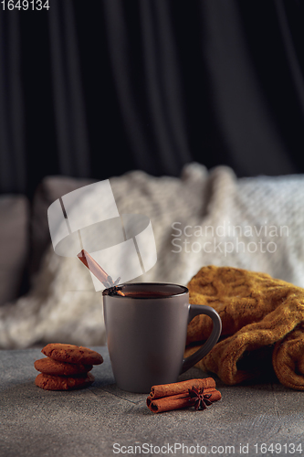 Image of Cup of tea or coffee with cinnamon and cookies isolated on grey and white background. Copy Space for ad, design.