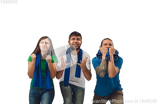 Image of Female and male soccer fans cheering for favourite sport team with bright emotions isolated on white studio background