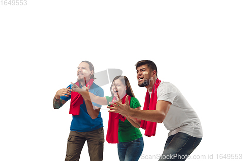 Image of Female and male soccer fans cheering for favourite sport team with bright emotions isolated on white studio background