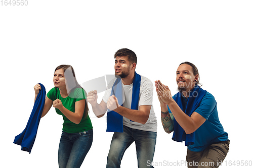 Image of Female and male soccer fans cheering for favourite sport team with bright emotions isolated on white studio background