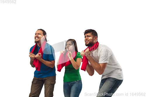 Image of Female and male soccer fans cheering for favourite sport team with bright emotions isolated on white studio background