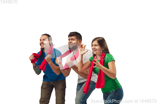 Image of Female and male soccer fans cheering for favourite sport team with bright emotions isolated on white studio background