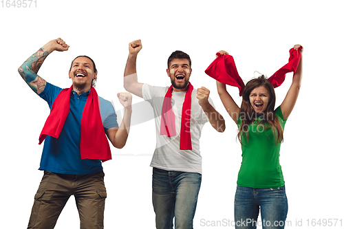 Image of Female and male soccer fans cheering for favourite sport team with bright emotions isolated on white studio background