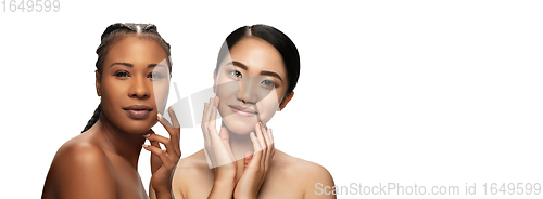 Image of Beautiful faces of young women with clean fresh skin isolated on white background. Flyer with copyspace.