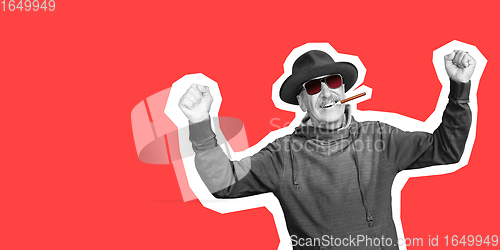 Image of Senior man in fashion sunglasses and black hat isolated on red background. Collage in magazine style.