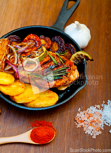 Image of roasted grilled BBQ chicken breast with herbs and spices