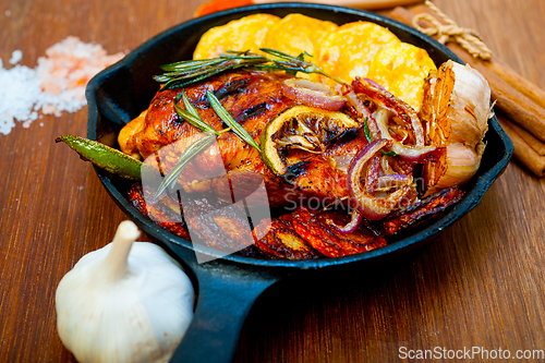 Image of roasted grilled BBQ chicken breast with herbs and spices