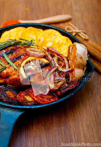 Image of roasted grilled BBQ chicken breast with herbs and spices