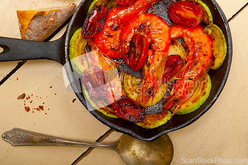 Image of roasted shrimps with zucchini and tomatoes