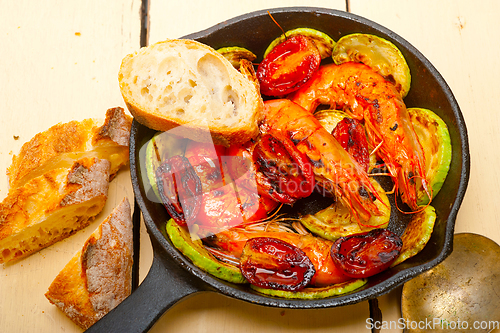 Image of roasted shrimps with zucchini and tomatoes