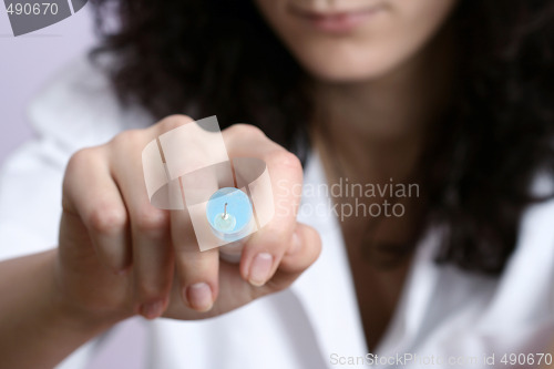 Image of Portrait of a young doctor with syringa.