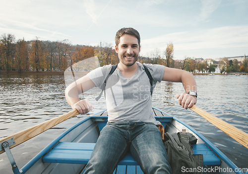 Image of Man rowing on the river