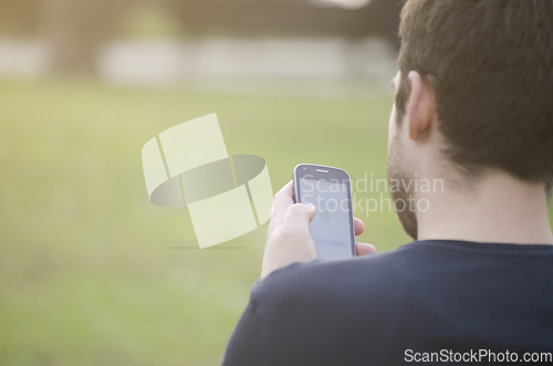 Image of Man with smart phone