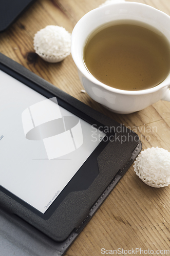 Image of E-book reader and tea 