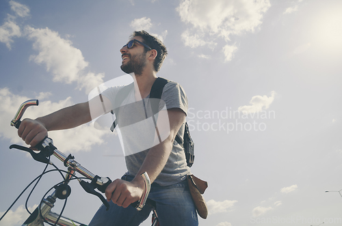 Image of Man with bicycle
