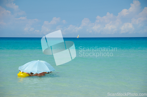 Image of Parasol at exotic beach