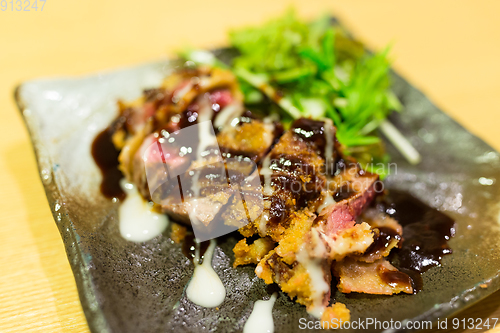 Image of Grilled meat on plate