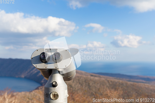 Image of Tourist binocular in landscape