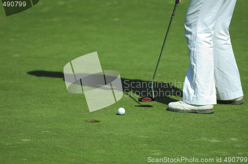 Image of putt on golf course