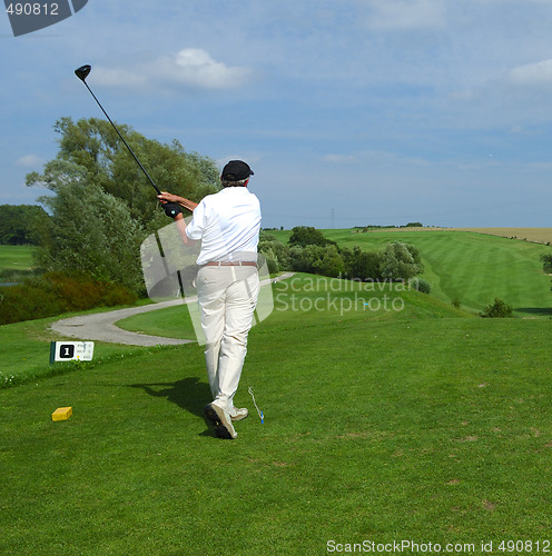 Image of golfer doing a swing