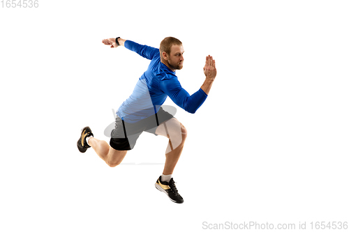 Image of Caucasian professional runner, jogger training isolated on white studio background in fire