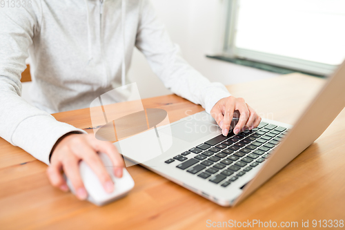 Image of Woman using laptiop computer 