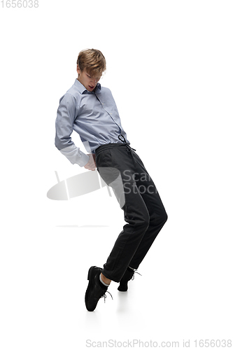 Image of Happy young man dancing in casual clothes or suit, remaking legendary moves of celebrity from culture history