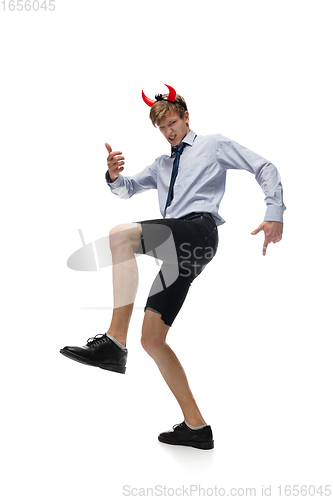 Image of Happy young man dancing in casual clothes or suit, remaking legendary moves of celebrity from culture history