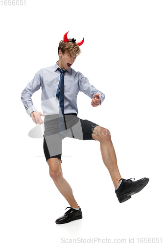 Image of Happy young man dancing in casual clothes or suit, remaking legendary moves of celebrity from culture history
