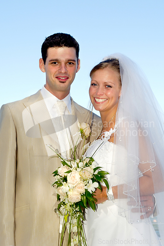 Image of Happy wedding couple smiling