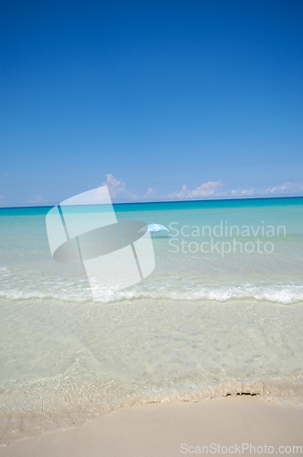 Image of Parasol on exotic beach