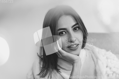 Image of Portrait of beautiful woman isolated on white studio background. Comfort, warm in winter concept