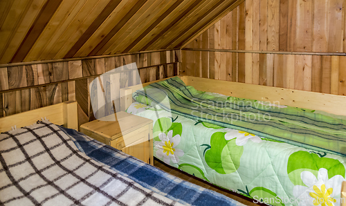 Image of Bedroom in a Wooden Chalet