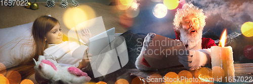 Image of Happy caucasian little girl during video call or messaging with Santa using laptop and home devices, celebration or ad flyer with copyspace