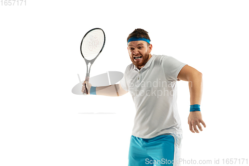 Image of Funny emotions of professional tennis player isolated on white studio background, excitement in game