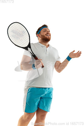 Image of Funny emotions of professional tennis player isolated on white studio background, excitement in game