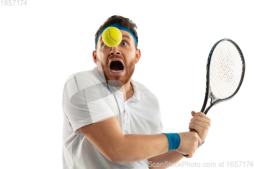 Image of Funny emotions of professional tennis player isolated on white studio background, excitement in game