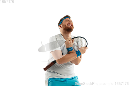 Image of Funny emotions of professional tennis player isolated on white studio background, excitement in game