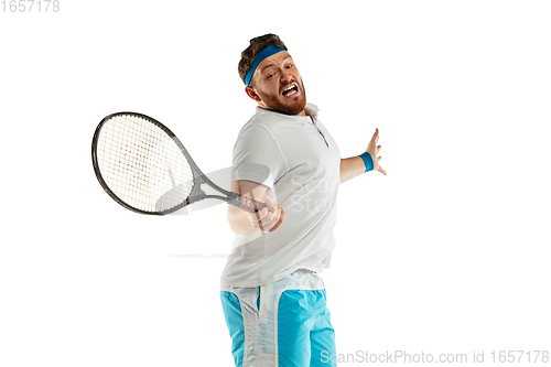 Image of Funny emotions of professional tennis player isolated on white studio background, excitement in game