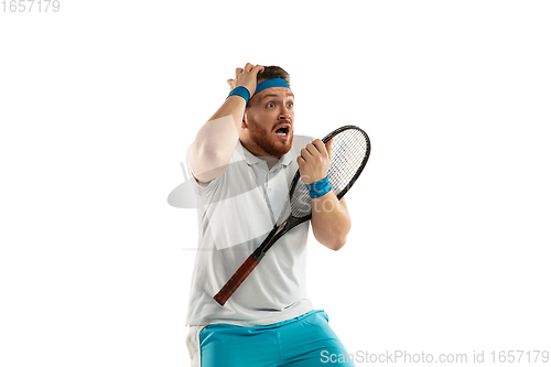 Image of Funny emotions of professional tennis player isolated on white studio background, excitement in game