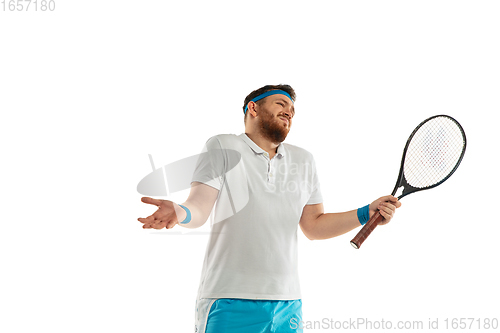 Image of Funny emotions of professional tennis player isolated on white studio background, excitement in game