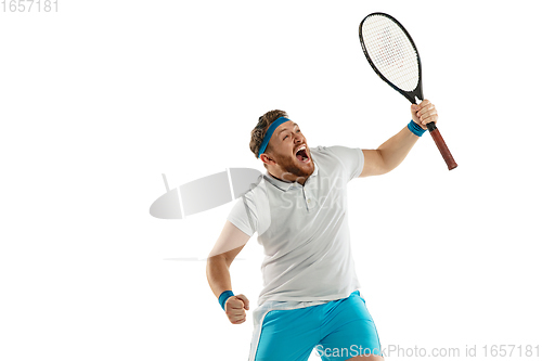 Image of Funny emotions of professional tennis player isolated on white studio background, excitement in game