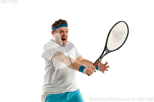 Image of Funny emotions of professional tennis player isolated on white studio background, excitement in game