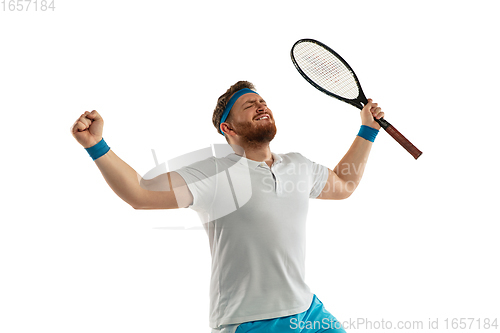 Image of Funny emotions of professional tennis player isolated on white studio background, excitement in game